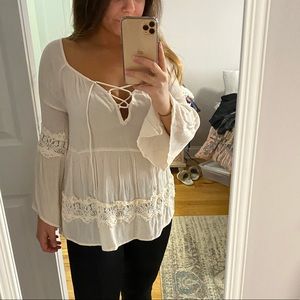 Cute cream, lace detailed, tie front peasant top!